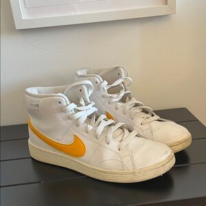 Nike White High-Top Sneakers with Yellow Swoosh Accent